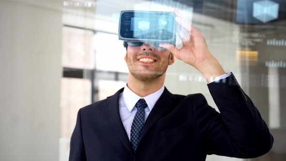 Businessman with Vr Headset and Cube on Screen