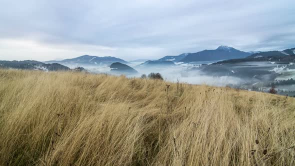 Dry Grass in Cloudy Mountains