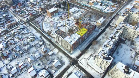 Hoisting Cranes and Building Activity