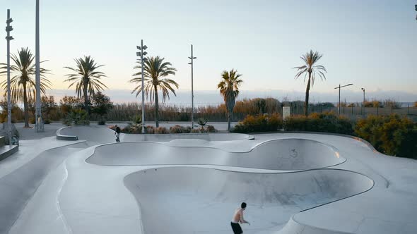 Drone Shot of Professional Skater Ride in Pool