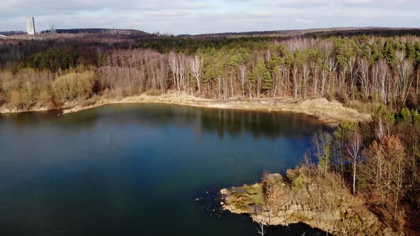 Mining excavation flooded with water.