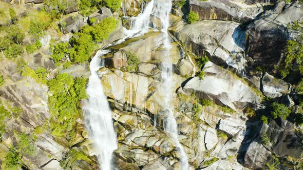 Aerial, A Waterfall In The Middle Of Rain Forest At Davies Creek In Queensland, North Australia