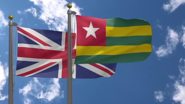United Kingdom Flag Vs Togo Flag On Flagpole