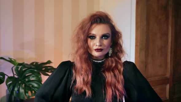 Portrait Confident Makeup Redhair Woman on Halloween, Gothic Girl Look at Camera