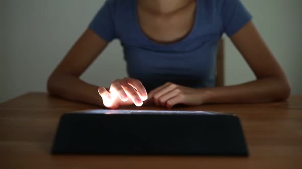 Woman using digital tablet computer