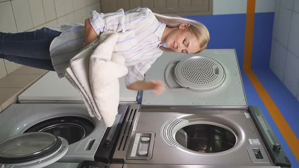 Attractive Housewife in the Laundry Room