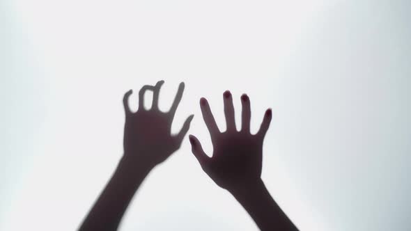 Abstract And Spooky Defocused Hand On White Background