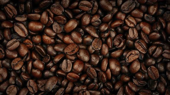 Overhead Closeup Shot Of Coffee Beans Turning Slowly