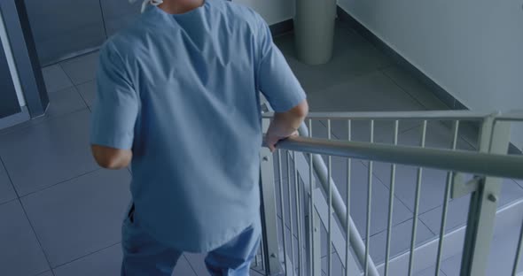 Medical professional working at a hospital alt