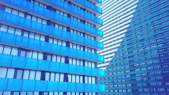 facade of a modern mirrored office building was removed from a drone. close-up