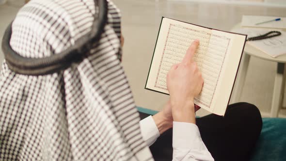 Man Praying Reading Quran Closeup Islamic Religion