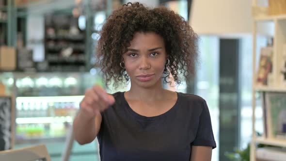 Portrait of Young African Woman with No Gesture By Finger