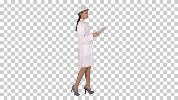 Young Woman Engineer Walking with Tablet, Alpha Channel