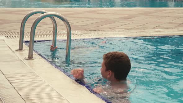 Two Boys in Pool