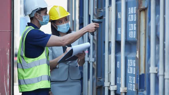 People checking container cargo