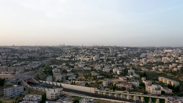 Aerial fly over urban city area of center Israel, middle eastern city