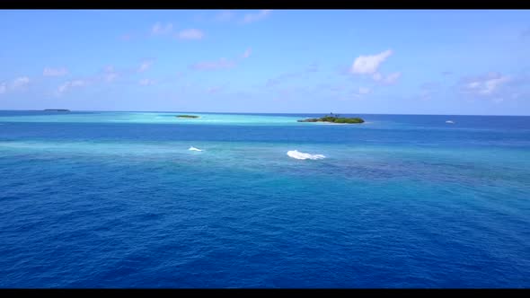 Aerial top down panorama of luxury seashore beach adventure by aqua blue sea and bright sand backgro