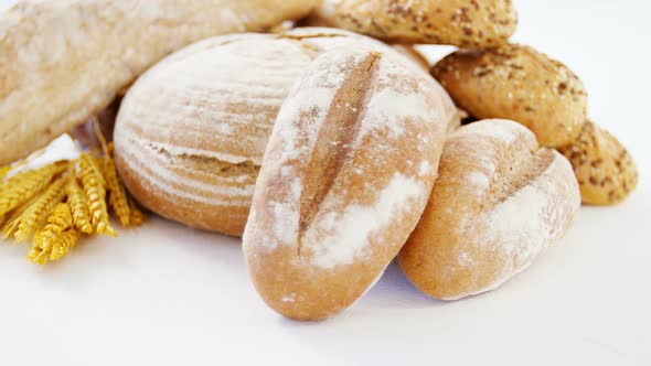 Various types of breads with wheat grains