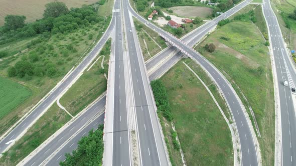Aerial view of Highway and overpass. Road junction. Transportation and infrastructure development