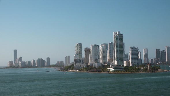 Modern city with high buildings on the beach. Caribbean cruise.