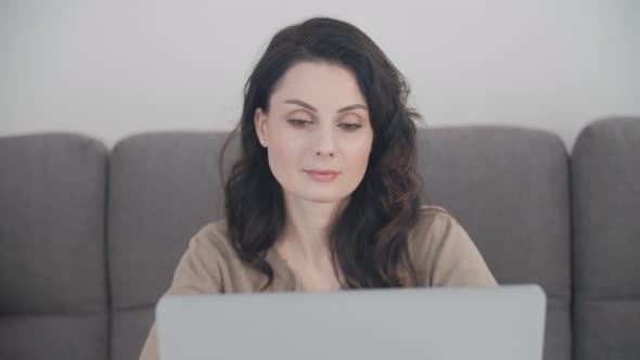 Free lance worker woman doing work from home on lockdown