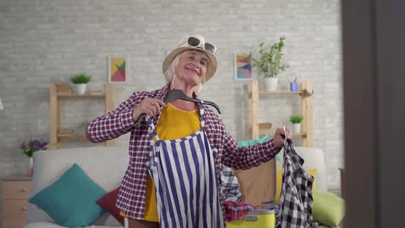 Smiling Old Woman Going Vacation Trying Clothes Front Mirror