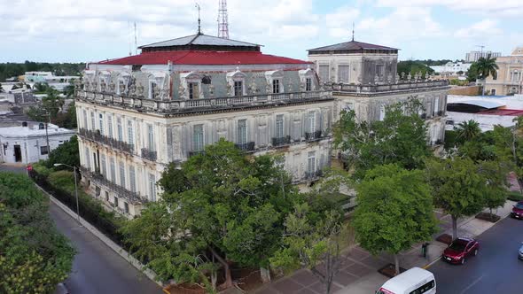 Aerial descent showing the the Casa Gemelas, twin houses on the Paseo Montejo in Merida, Yucatan, Me