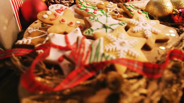 Close-up of various christmas desserts and gifts