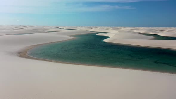 Sand dunes and rain water lagoons at northeast brazilian paradise