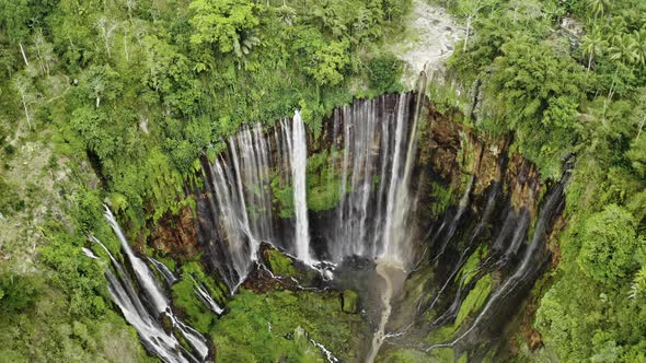 Drone Flight Tilting Up Shot Of Tumpak Sewu Waterfalls