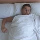 Man Waking Up From Sleep on Bed - VideoHive Item for Sale