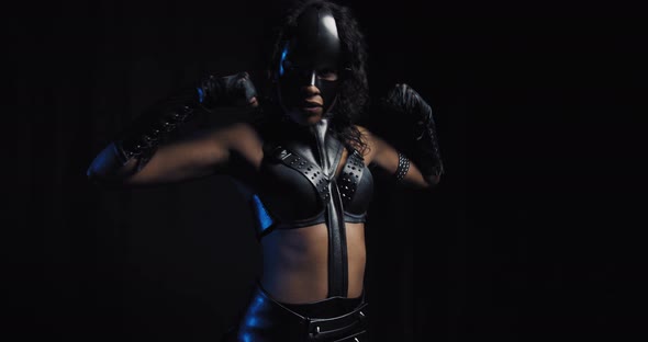 Catwoman Is Flexing and Posing in the Studio Cosplay Model