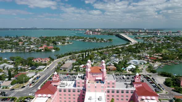 Flying Over The Famous And Luxurious Don Cesar Hotel With Expansive View Of The Coastal Cityscape In