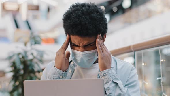 African American Business Man Guy Student Wearing Medical Mask Working with Laptop in Corporate