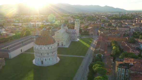 Aerial view of Piazzale dei Miracoli in Pisa at sunset, Italy.