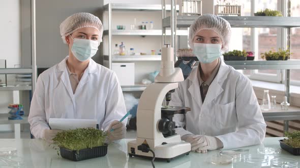 Two Female Scientists Working in Laboratory