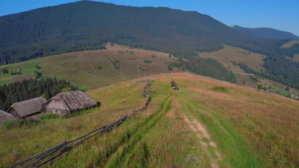 ATV Quad Bike Riders on Beautiful Mountain Background