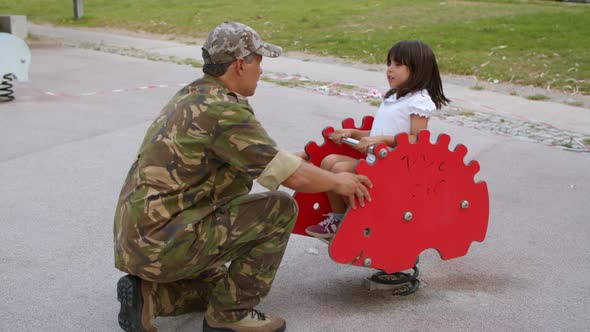 Girl Enjoying Time with Military Daddy