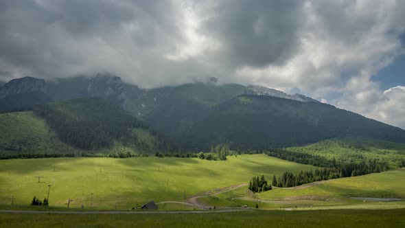 Cloudy day over Bielskie Tatra mountains in summer, Slovakia, timelapse, 4K