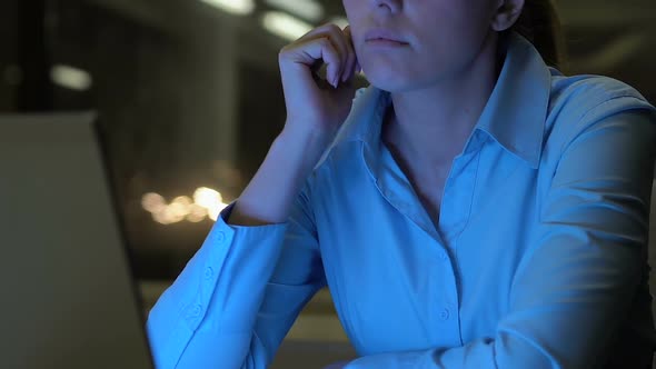 Young Company Employee Feeling Bored During Night Shift Office, Lack of Interest