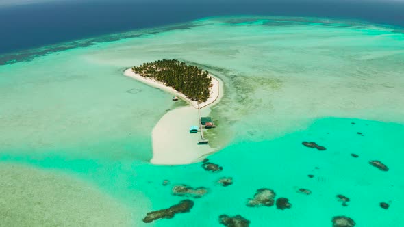 Tropical Island with Beach and Atoll with Coral Reef. Onok Island Balabac, Philippines