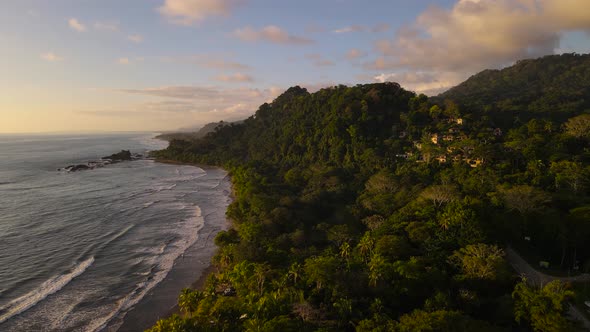Incredible aerial shot at sunset of the beautiful Dominicalito beach in Costa Rica