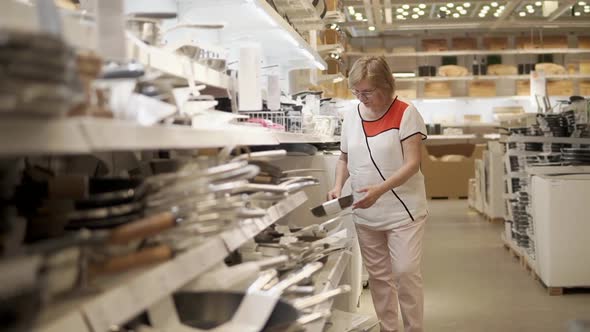 Woman Shopping for Household Goods