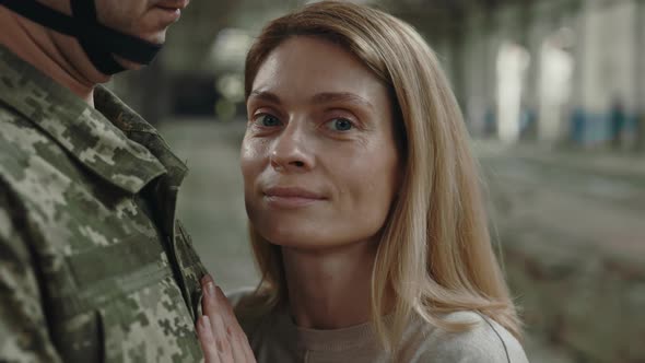 Close Up of Woman Hugging Soldier After Long Time