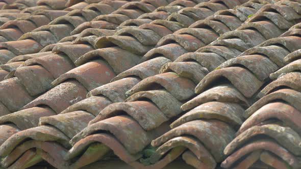 Ancient roofing material made of clay 4K 2160p UHD panning  footage - Roof top tiles old material 4K