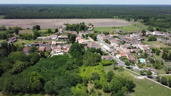 Noaillan in the South Gironde seen from the sky in tracking back shot in France