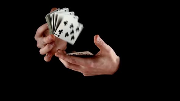 Magician Shuffling the Cards, on Black, Slow Motion