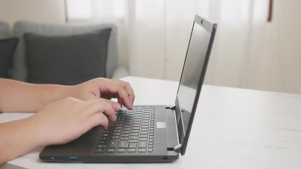 Man using laptop in home office Workplace with programmer technology. Concept of finishing work.