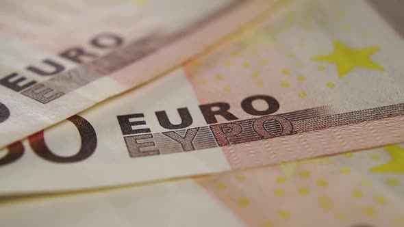 Detail of a fifty euro banknote. Close-up currency text symbol