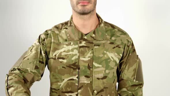 Soldier saluting on white background